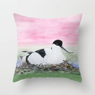 watercolour of avocet printed on a cushion